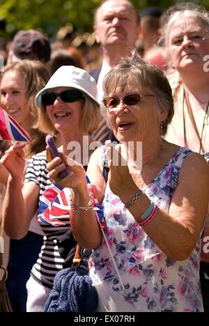 Displays of patriotism from the crowd at the Farewell to the Garrison Festival, Bordon, Hampshire, UK. Saturday 27 June 2015. Stock Photo