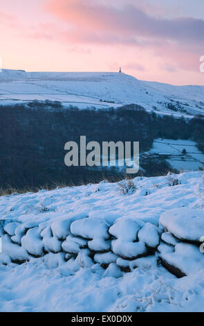 View over the Calder Valley to Stoodley Pike from above Hebden Bridge in winter, Calderdale, West Yorkshire, UK Stock Photo