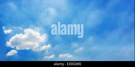 Blue sky panorama with a few white clouds in the corner, ideal as a light background Stock Photo