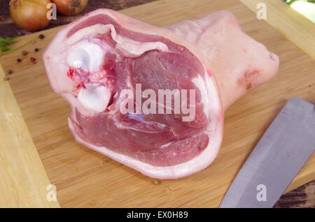 raw knuckle of pork on wooden board, Stock Photo