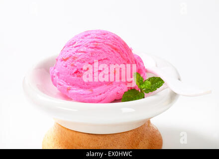 Scoop of pink ice cream in a dessert bowl Stock Photo