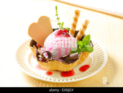 Ice cream served in waffle basket Stock Photo