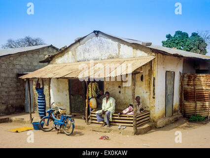 People in front of their house, Juffureh village, Gambia, West Africa Stock Photo