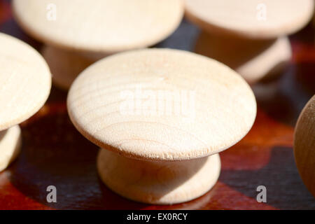 Macro shot of wood knobs on a working table Stock Photo