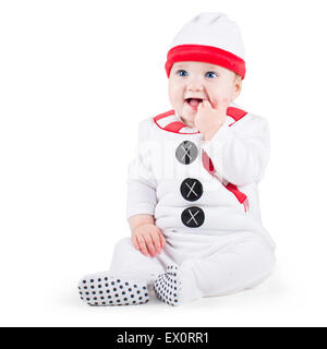 Happy laughing baby wearing a Christmas snow man costume on white background Stock Photo