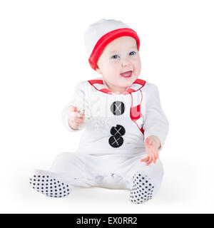 Happy laughing baby wearing a Christmas snow man costume on white background Stock Photo