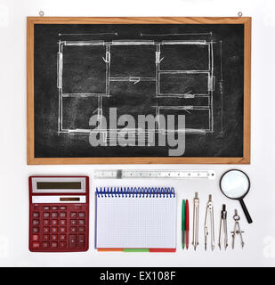 chalk board with drawing blueprint and business elements Stock Photo