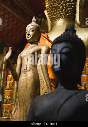 Buddha statues Wat Xieng Thong  Luang Prabang. Laos. Stock Photo