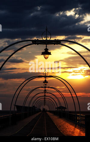 Southport, Merseyside, UK. 3rd July, 2015. A beautiful sunset over the Grade II listed Southport Pier, the oldest iron pier in the country which has stood for over 150 years. A walk to the end of Southport Pier will give you views across the North West and on a clear day you can see neighbouring Blackpool. Credit: Cernan Elias/Alamy Live News Stock Photo