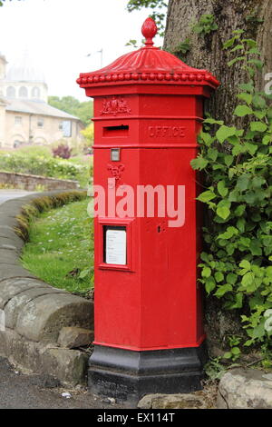 A Victorian red pillar box of the Penfold  type in Buxton Derbyshire England UK - in use, 2015 Stock Photo