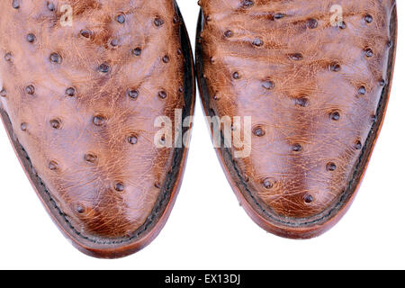 Macro shot of a pair of ostrich leather boots on white Stock Photo