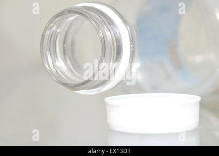 Macro of an empty plastic botlle and cap Stock Photo
