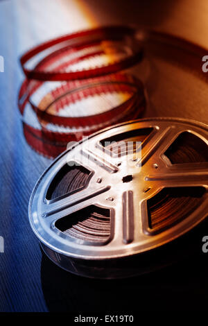 Motion picture film reel on the table Stock Photo