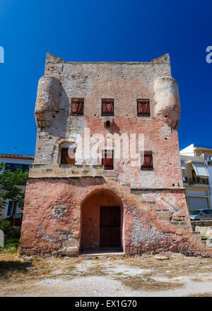 Markelos old, red tower in Aegina city, Aegina island in Greece Stock Photo