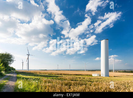 A halfway deconstructed wind turbine in a wind park that collapsed during a storm in the Eifel, Germany. Stock Photo