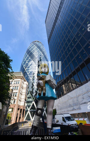 The Gherkin, London, UK. 4th July 2015. The 7m Damien Hirst sculpture, 'Charity' The Gherkin 2015 Sculpture in the City exhibit Stock Photo