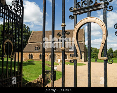 Golden horseshoe on the black wrought iron gates of Oakham Castle, with ...