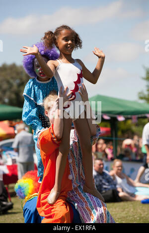 Biggin Hill, UK. 4th July, 2015. Bright sparks kids dressed up as clowns at the Biggin Hill Festival Credit:  Keith Larby/Alamy Live News Stock Photo