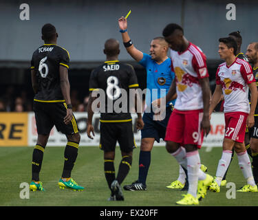 Columbus Crew SC midfielder Tony Tchani (6) hugs coach head coach Gregg ...