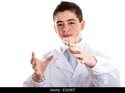 Boy dressed as a doctor in light blue tie and white coat helps to feel medicine more friendly: he making the gesture of moving hands as to reach viewers, catch something and drive to him. This means drive attention and give importance at the same time to Stock Photo