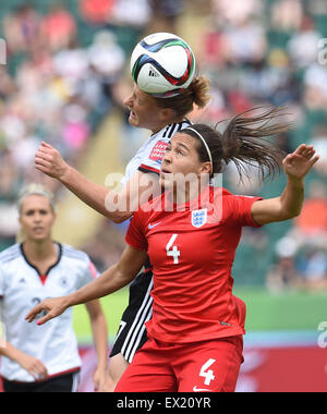 Edmonton, Canada. 4th July, 2015. Fara Williams (R) of England competes during the third place match of the FIFA 2015 Women's World Cup against Germany at Commonwealth Stadium, in Edmonton, Canada, on July 4, 2015. England defeated Germany 1-0 in extra time and won the third place of the FIFA 2015 Women's World Cup. Credit:  Wang Yuguo/Xinhua/Alamy Live News Stock Photo