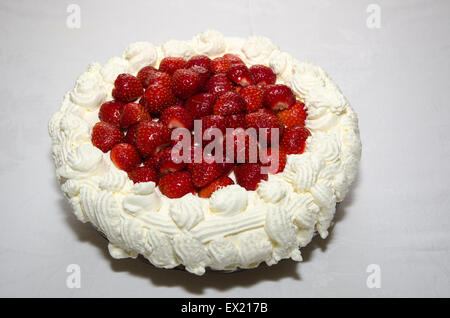 Creamy delicious strawberry cake at white background Stock Photo