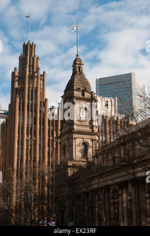 Town Hall tower (foreground) and Manchester Unity Building in Collins Street, Melbourne Stock Photo