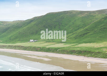 Rhossili Bay beach on the Gower Peninsula in South Wales. Voted one of the top 10 most beautiful beaches in the world. Stock Photo