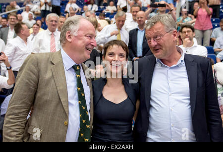 Essen, Germany. 5th July, 2015. Frauke Petry (C), the newly elected chairwoman of the eurosceptic Alternative for Germany (AfD), vice chair Alexander Gauland (L), and party co-leader Joerg Meuthen (R) pose for a picture at the AfD party convention in Essen, Germany, 05 July 2015. AfD is holding their two-days party convention in Essen in the light of a row for the party's leadership between until then co-leaders Lucke and Petry, who received about 60 per cent of the votes of the delegates. Credit:  dpa picture alliance/Alamy Live News Stock Photo