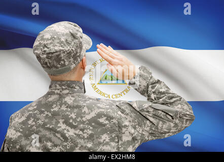 National military forces with flag on background conceptual series - Nicaragua Stock Photo