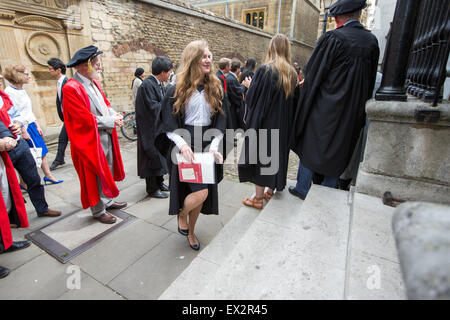 Students from Cambridge University on graduation day after passing their exams and receiving their degree. Stock Photo