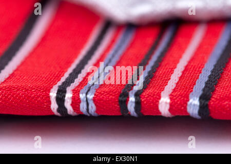 Close up detailed view of colorful striped fabric as background. Stock Photo