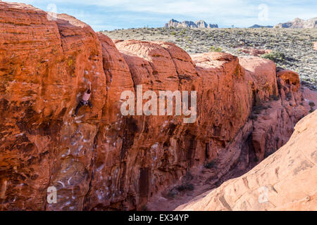 A rock climber leads a sport route at The Pier in Red Rock, Nevada. Stock Photo