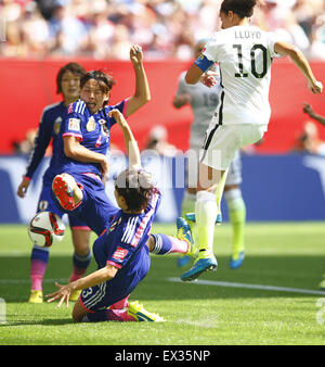 Vancouver, Canada. 05th July, 2015. (150706) -- VANCOUVER, July 6, 2015(Xinhua) -- Carli Lloyd (R) of the United States scores during the final against Japan at the 2015 FIFA Women's World Cup in Vancouver, Canada on July 5, 2015. Credit:  Xinhua/Alamy Live News Stock Photo