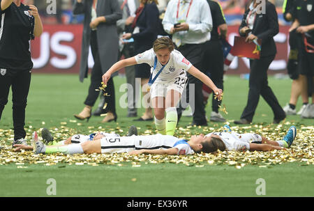 Vancouver, Canada. 05th July, 2015. Players of the United States celebrate after the victory ceremony for the 2015 FIFA Women's World Cup in Vancouver, Canada on July 5, 2015. The United States claimed the title after defeating Japan with 5-2. Credit:  Xinhua/Alamy Live News Stock Photo