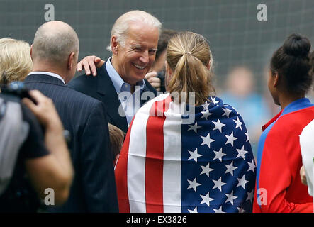 Vancouver, Canada. 05th July, 2015. U.S. Vice President Joe Biden talks with player of the U.S. team after the final of FIFA Women's World Cup 2015 between the United States and Japan at BC Place Stadium in Vancouver, Canada on July 5, 2015. The United States claimed the title after defeating Japan with 5-2. Credit:  Xinhua/Alamy Live News Stock Photo
