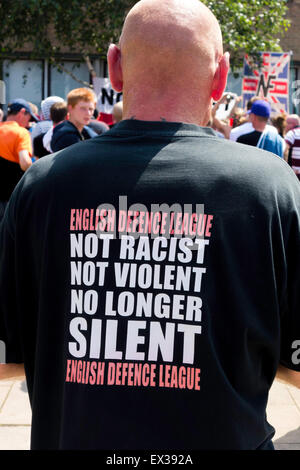 A white man at an EDL rally with a Tee Shirt captioned  English Defence League Not Racist Not Violent No Longer Silent Stock Photo