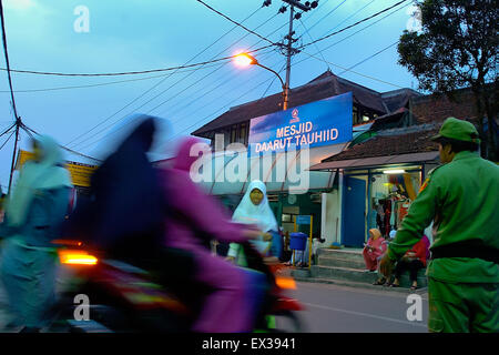 Early morning street scene near the famous Daarut Tauhiid mosque in Gegerkalong, Bandung, Indonesia. Stock Photo