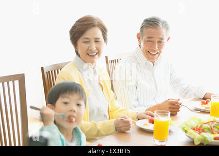 Japanese family together in the kitchen Stock Photo