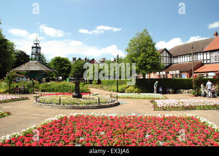 Flower beds in full bloom on a hot summer day at Hall Leys Park; a traditional English green space in Matlock, Derbyshire UK Stock Photo