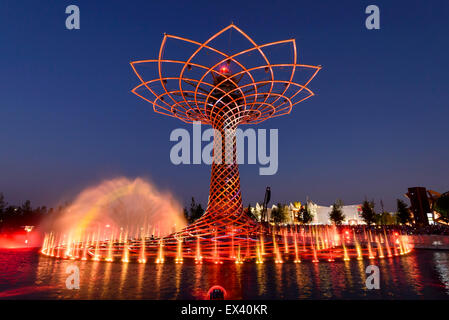MILAN, ITALY - jun 30: EXPO 2015,  night view of red colored gushes at the lights show on the fair symbol structure 06 Stock Photo