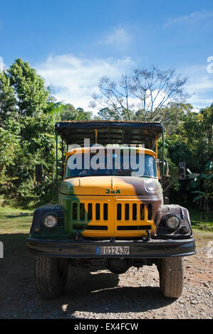 Vertical view of an old Russian military truck transporting tourists around Topes de Collantes National Park in Cuba. Stock Photo