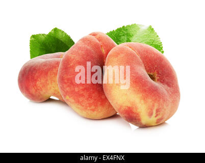 ripe fig peach with leaves isolated on white background. Stock Photo