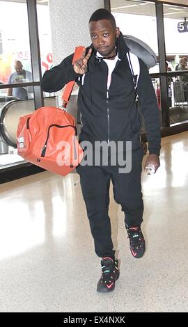 Lamorne Morris, best known for playing Winston in the Fox sitcom 'New Girl', departs Los Angeles International Airport (LAX)  Featuring: Lamorne Morris Where: Los Angeles, California, United States When: 05 May 2015 C Stock Photo