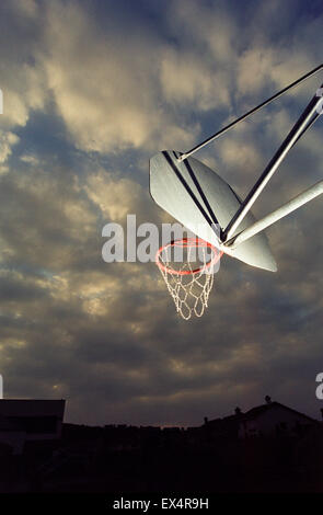 LOS ANGELES, CA – OCTOBER 15: Basketball hoop at night in Los Angeles, California on October 15, 2002. Stock Photo