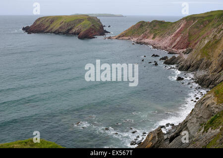 Sandstone Cliffs with Gateholm Island & Skokholm Island beyond, Pembrokeshire, West Wales Stock Photo