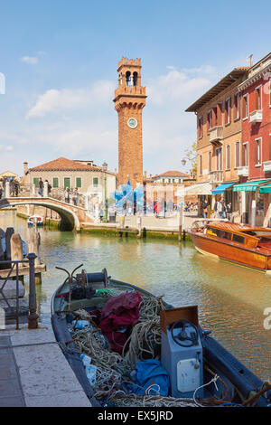 Murano canalside scene looking towards Campo Santo Stefano clock tower Venetian Lagoon Veneto Italy Europe Stock Photo