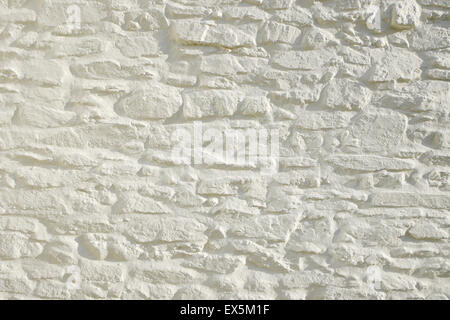 White painted stone wall Wales UK  KATHY DEWITT Stock Photo