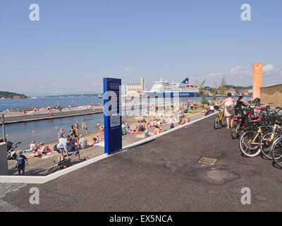 A new inner city public beach with large wooden sundecks and sand for the kids opened 2015 in Sorenga Oslo Norway, Stock Photo