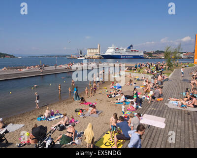 A new inner city public beach with large wooden sundecks and sand for the kids opened 2015 in Sorenga Oslo Norway Stock Photo